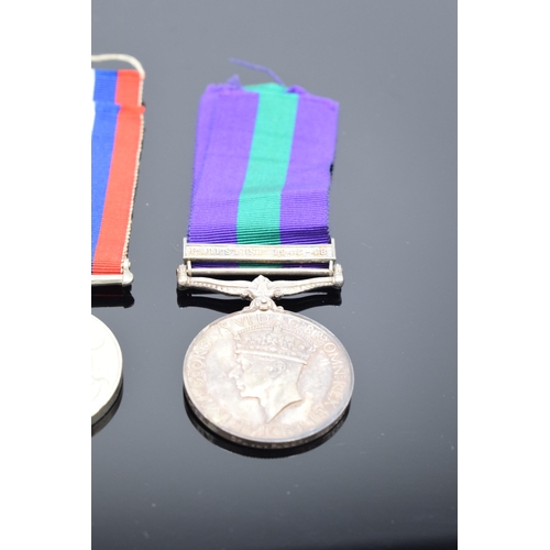 232 - A collection of militaria to include George VI silver Palestine 1945-48 medal and ribbon awarded to ... 