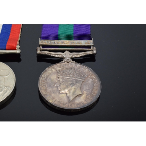 232 - A collection of militaria to include George VI silver Palestine 1945-48 medal and ribbon awarded to ... 