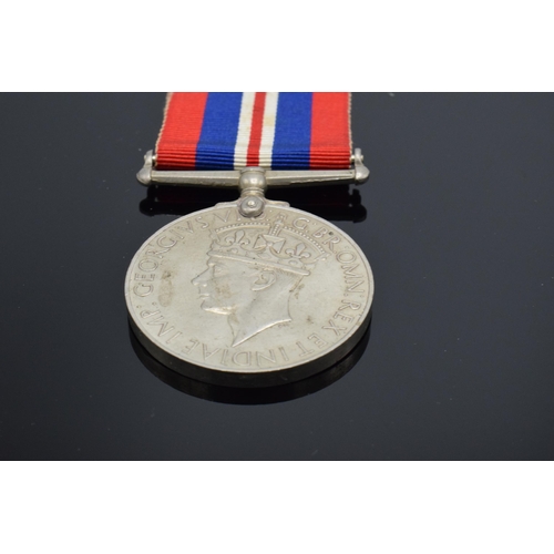 232 - A collection of militaria to include George VI silver Palestine 1945-48 medal and ribbon awarded to ... 