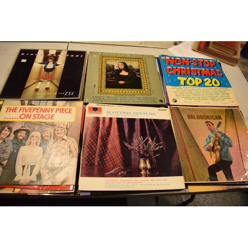 240 - A collection of easy-listening and other genres of 12'' vinyls to include Doris Day, Pam Ayres, Soun... 