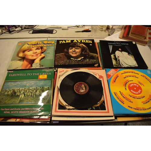 240 - A collection of easy-listening and other genres of 12'' vinyls to include Doris Day, Pam Ayres, Soun... 