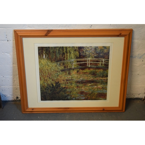 267 - A framed Claude Monet print of Waterlilies. 68 x 57cm inc frame.