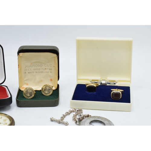 273 - A mixed collection of items to include cased cufflinks, a Rotary wristwatch, metal Albert chains, on... 