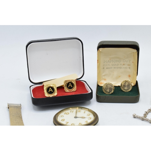 273 - A mixed collection of items to include cased cufflinks, a Rotary wristwatch, metal Albert chains, on... 