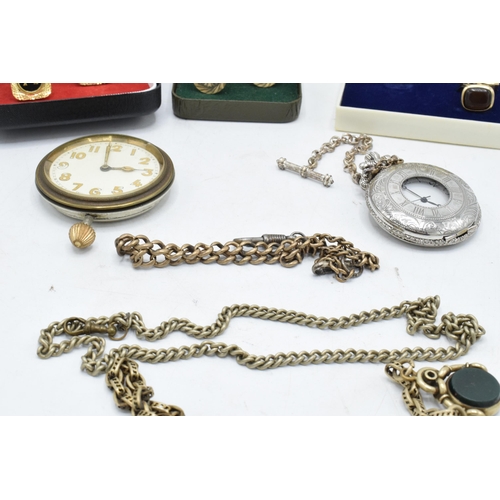 273 - A mixed collection of items to include cased cufflinks, a Rotary wristwatch, metal Albert chains, on... 