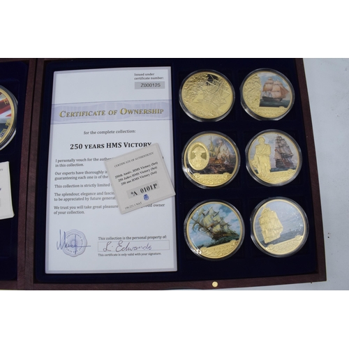 294 - A cased coin set to commemorate 250 Years of HMS Victory (6 coins with certificate) together with Su... 