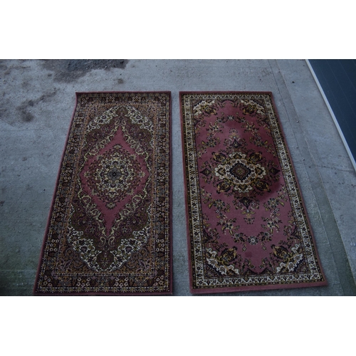 313 - A pair of similar Grosvenor Worsted Wilton Persian reproduction rugs. Both appear to be in good cond... 