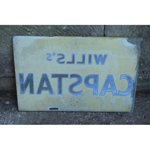 318 - A vintage glass advertising sign of rectangular form for Wills's Capstan. 60 x 40cm. No postage.