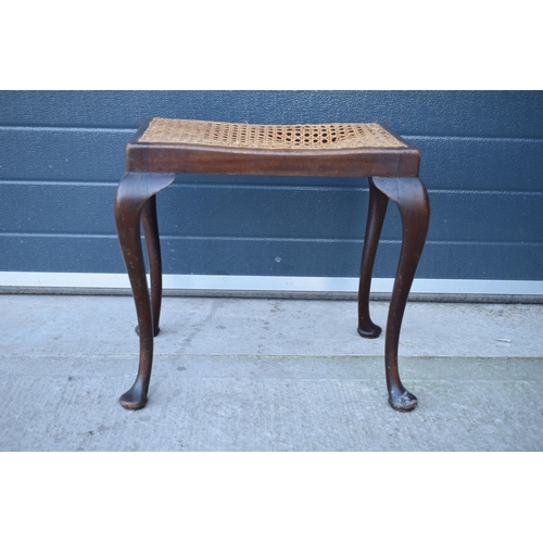 320 - An early 20th century wooden piano stool on cabriole legs. 51 x 36 x 45cm tall.