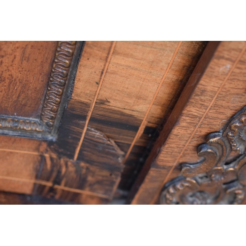 322 - A Victorian walnut breakfront credenza with an inlaid panel door flanked by bow glass doors enclosin... 