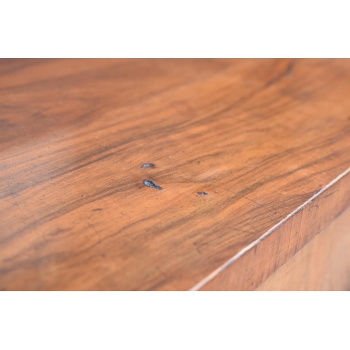 322 - A Victorian walnut breakfront credenza with an inlaid panel door flanked by bow glass doors enclosin... 