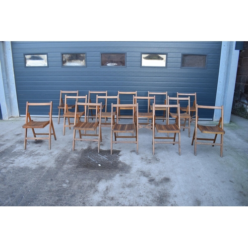 325 - A collection of 14 early to mid 20th century folding wooden chapel chairs (14). In good functional c... 