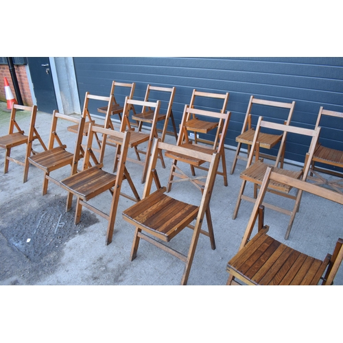 325 - A collection of 14 early to mid 20th century folding wooden chapel chairs (14). In good functional c... 