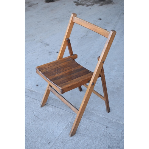 325 - A collection of 14 early to mid 20th century folding wooden chapel chairs (14). In good functional c... 