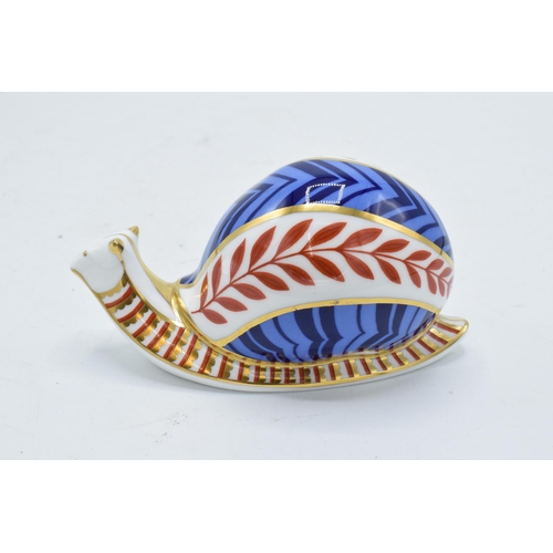 49 - Royal Crown Derby paperweight in the form of a snail. First quality with stopper. In good condition ... 