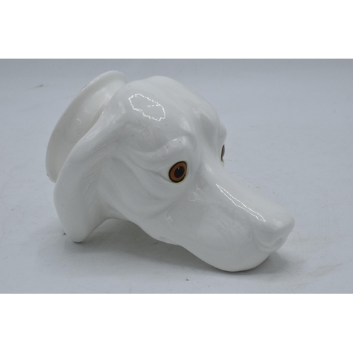 63 - James Kent Old Foley fine bone china stirrup cup in the form of a dog's head in a white glaze. In go... 