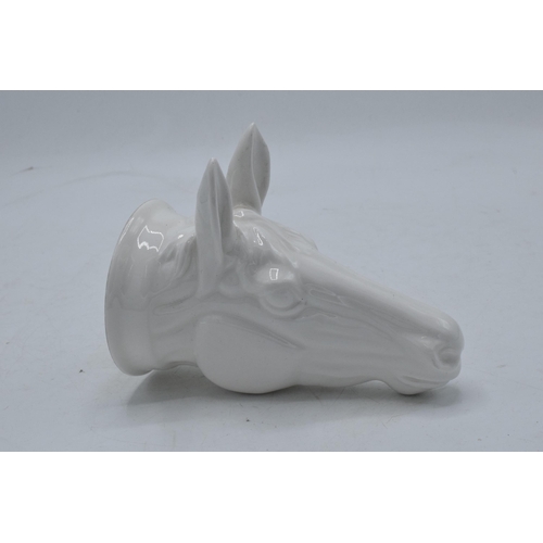 65 - James Kent Old Foley fine bone china stirrup cup in the form of a horse's head in a white glaze. In ... 