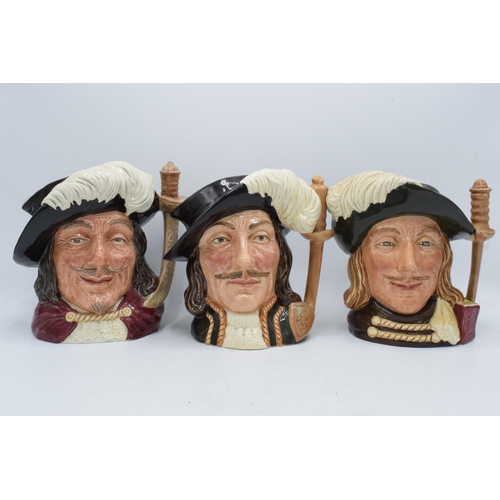 70 - A trio of large Royal Doulton character jugs to include the Three Musketeers Aramis D6441, Athos D64... 