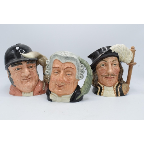 75 - A trio of large Royal Doulton character jugs to include Lawyer D6498, Gone Away D6531 and Athos D643... 