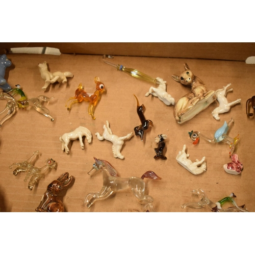 9 - A mixed collection of small collectables to include Wade Whimsies, glass animals, small pottery figu... 