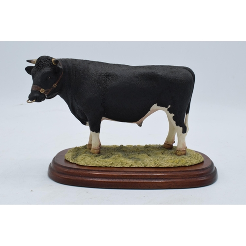 92 - Border Fine Arts Dairy Bull by Anne Butler on wooden base. In good condition with no obvious damage ... 