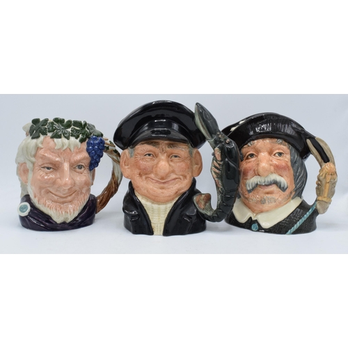 77 - A trio of large Royal Doulton character jugs to include Bacchus D6499, Lobsterman D6617 and Sancho P... 