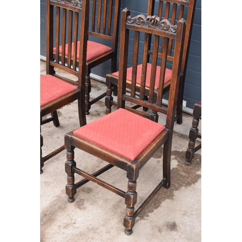 315A - A set of 5 matching Edwardian chairs with upholstered seat and carved crown decoration. (5). 105cm t... 