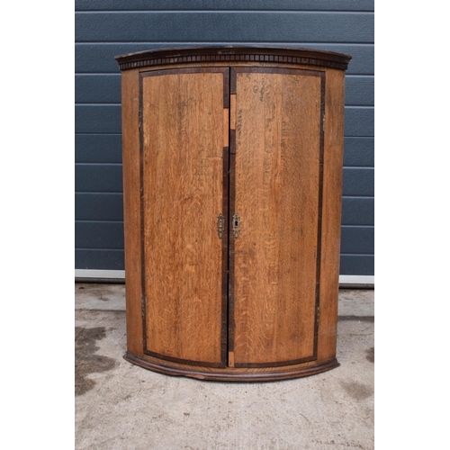 315C - A 19th century oak domed corner cupboard with 3 shelves. 87cm tall. In good functional condition wit... 