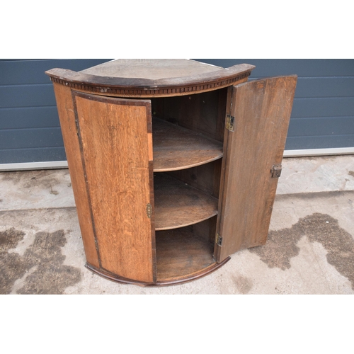 315C - A 19th century oak domed corner cupboard with 3 shelves. 87cm tall. In good functional condition wit... 