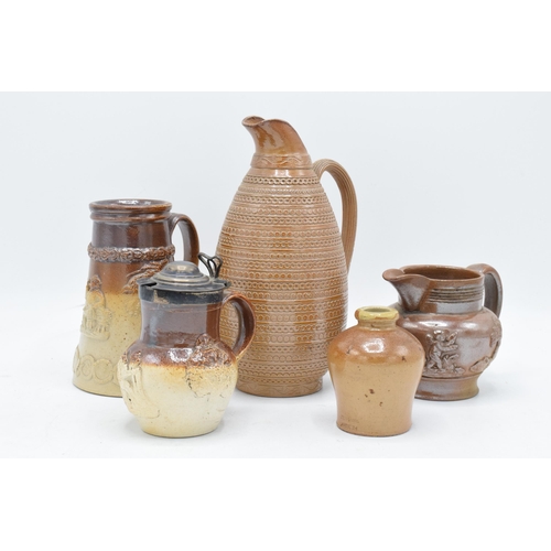 30 - A collection of 19th century stoneware items with traditional scenes to include two-tone examples su... 