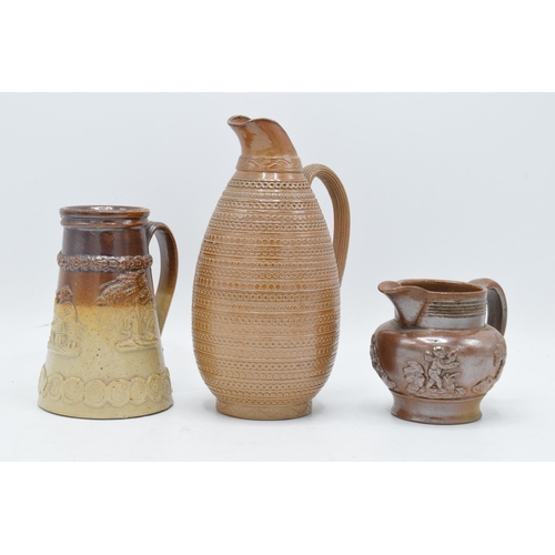 30 - A collection of 19th century stoneware items with traditional scenes to include two-tone examples su... 