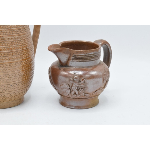 30 - A collection of 19th century stoneware items with traditional scenes to include two-tone examples su... 