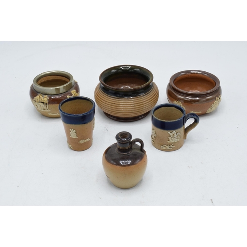 33 - A collection of Royal Doulton stoneware miniatures to include a flagon, blue beaker, blue tankard an... 