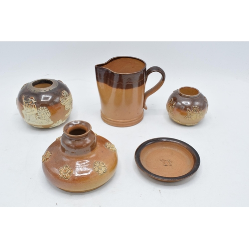 34 - A collection of mainly two-tone stoneware to include a Doulton Lambeth jug for E. Johnson & Co Alnwi... 