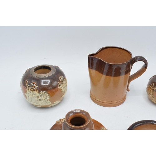 34 - A collection of mainly two-tone stoneware to include a Doulton Lambeth jug for E. Johnson & Co Alnwi... 