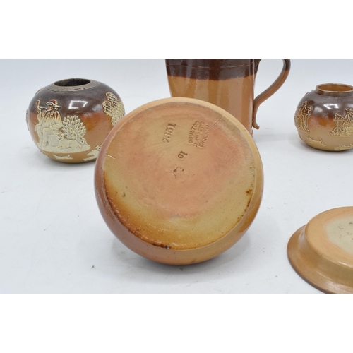 34 - A collection of mainly two-tone stoneware to include a Doulton Lambeth jug for E. Johnson & Co Alnwi... 