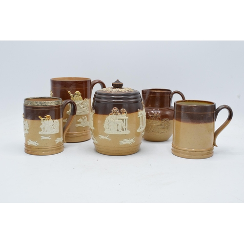 36 - A collection of Royal Doulton and Doulton Lambeth stoneware to include a tobacco jar, a tankard and ... 