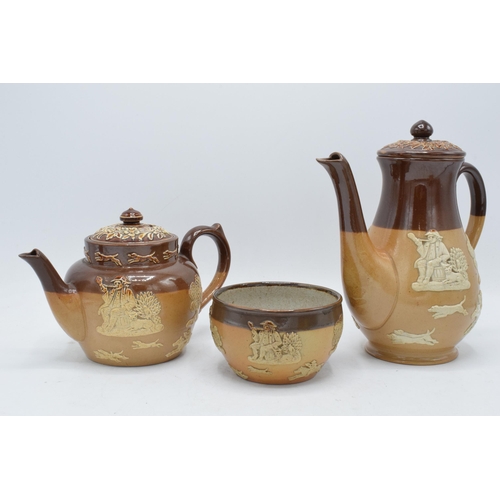 39 - A collection of stoneware depicting traditional country scenes to include a Doulton Lambeth teapot, ... 