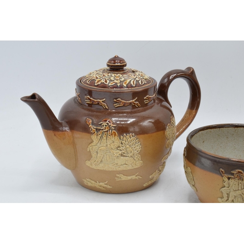 39 - A collection of stoneware depicting traditional country scenes to include a Doulton Lambeth teapot, ... 