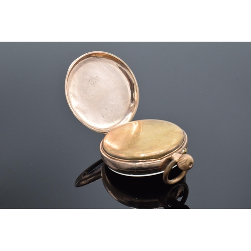 427 - A 9ct gold cased open-faced top-wind pocket watch. marked '9K' to inside of back. 34.4 grams gross w... 