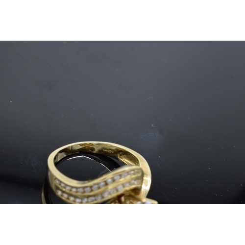 433 - 9ct gold ladies ring. 5.1 grams. Set with semi-precious stones. UK size P.