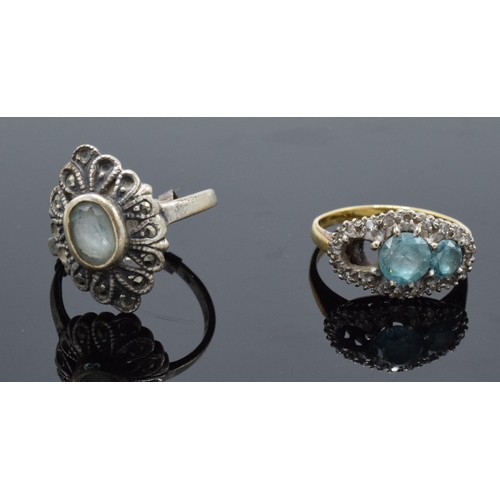 442 - An 18ct gold ring with illusion set diamonds and aqua marines (4.7 grams gross weight) (or similar) ... 