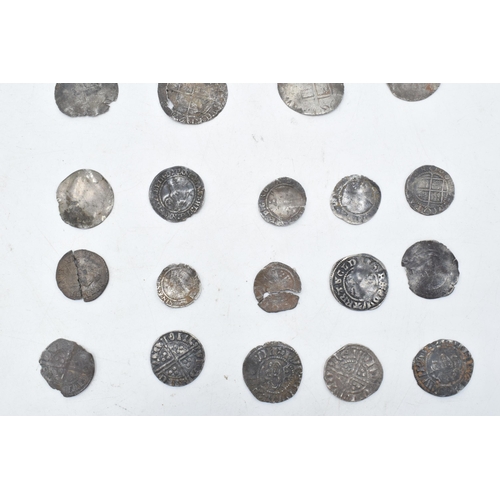 448A - A collection of antique hammered silver coins to include Elizabeth I examples and others in varying ... 