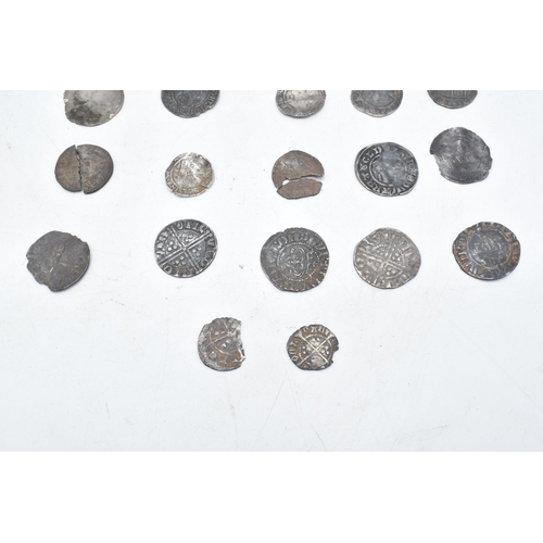 448A - A collection of antique hammered silver coins to include Elizabeth I examples and others in varying ... 