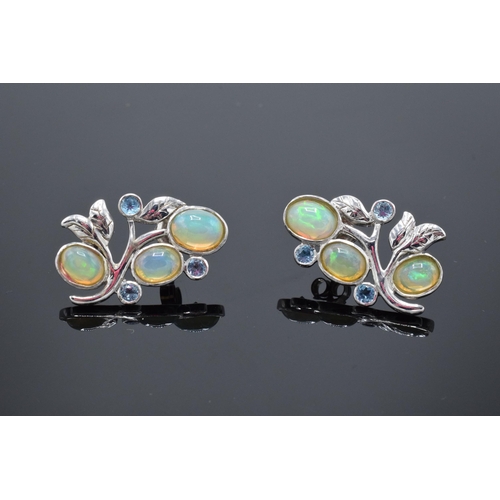 457 - A pair of silver and opal shaped earrings (2).