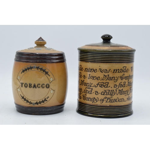 46 - A pair of Doulton Lambeth tobacco jars, one with 'Tobacco' to the front and another with a motto 'wh... 