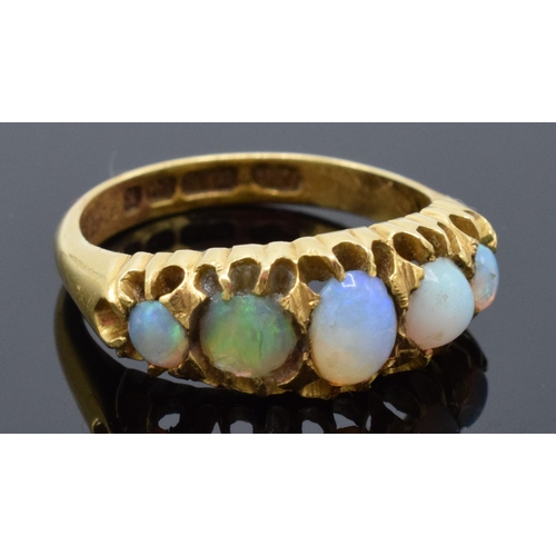 462 - 18ct gold ring set with 5 opals. 4.9 grams gross weight. 1897 Birmingham.