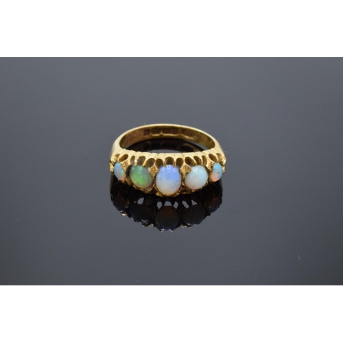 462 - 18ct gold ring set with 5 opals. 4.9 grams gross weight. 1897 Birmingham.