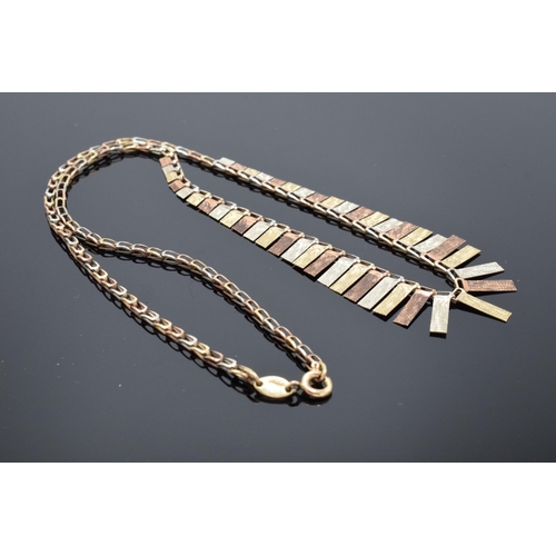 464 - 9ct tri-colour gold fringe necklace, made in Italy with UK import marks. 7.4 grams. 43cm long.