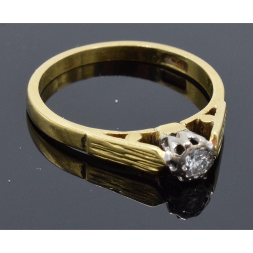 466 - 18ct gold and diamond solitaire ring. 0.08 carats. 3.1 grams. UK size O.